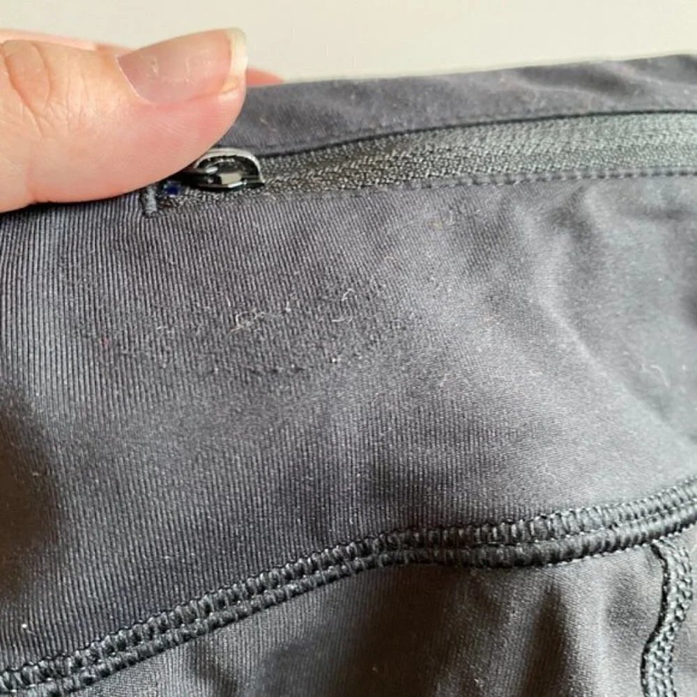 Lululemon Black Crops with Mesh Side Panel Size 6